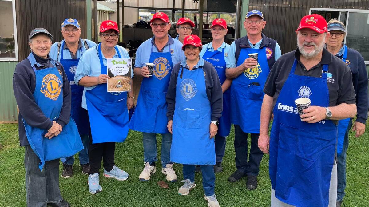 Members of Armidale Dumaresq Lions Club cooked breakfast for the Camp Quality esCarpade before they departed Armidale on Saturday morning. Picture: Armidale Dumaresq Lions Club