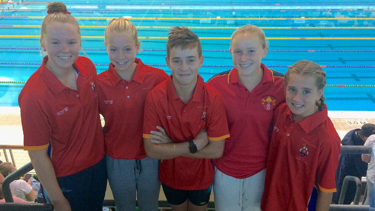 Lara Moloney, Isabella McKay, Ben Kaberry, Lily Lorimer and Aleesha Stuart at the Combined Catholic Colleges (CCC) Swimming Championships on Monday. Picture: Supplied