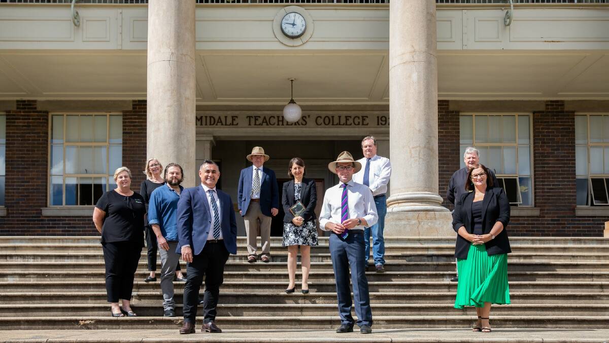 On the steps of the new home of the NSW Department of Regional NSW  the CB Newling Building at Armidale  New England Conservatorium of Music Administration Officer Nicky Price, left, Program Manager Corinne Arter, CEO Chris Clark, Deputy Premier John Barilaro, Friends of the Old Teachers College Graham Wilson OAM, Premier Gladys Berejiklian, Northern Tablelands MP Adam Marshall, NSW Crown Lands Group Leader Rodney OBrien, Archivist Bill Oates and Education Minister Sarah Mitchell.