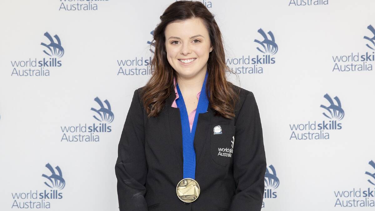 Armidale hairdresser Courtney Baldwin with her gold medal at the WorldSkills Australia 2018 National Championships.
