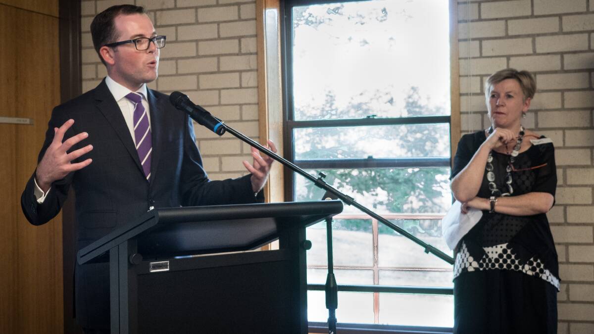 Northern Tablelands MP Adam Marshall speaking at the launch of the University of New England business incubator. The Head of UNE’s Business School Alison Sheridan is looking on.