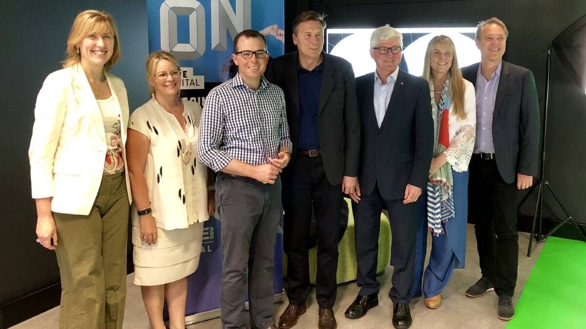 Jobs for NSW CEO Karen Borg, Armidale Regional Councillor Di Gray, Northern Tablelands MP Adam Marshall, Jobs for NSW Chairman David Thodey, and board members Chris Roberts, Jane Cay and Craig Dunn at the TAFE NSW Digital Lab in Armidale on Sunday.