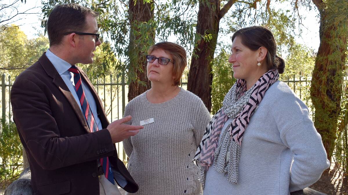 Northern Tablelands MP Adam Marshall discussing the funding windfall for St Peter’s Preschool in Armidale with Dierctor Jane Schutz and teacher Natalie Rich.