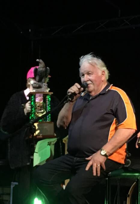 LATEST LEGEND: Reg Poole received the award from Pauline Fisher, on stage at the Slim Dusty Country Music Festival on Friday, October 21.