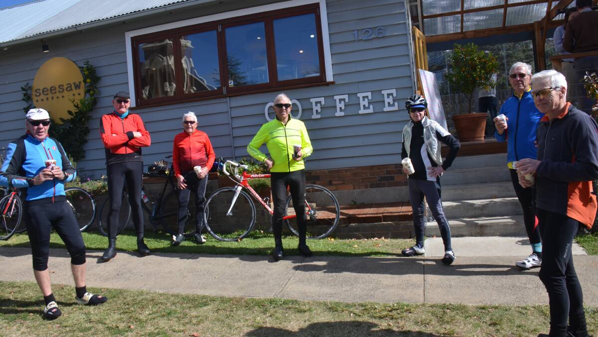 The group of cyclists stop for coffee at Seesaw.