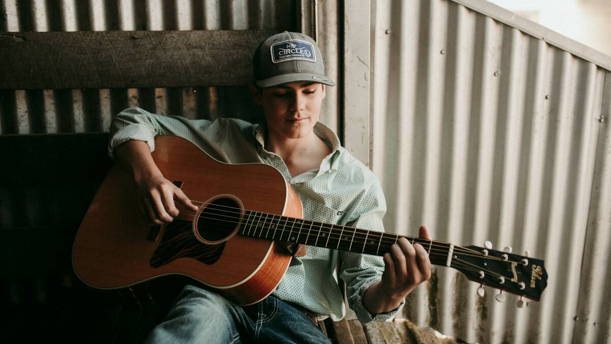 NEW SONG: Sixteen-year-old Charlie Fittler has released a song, The Guitar Can't Drink A Beer, which he wrote with Travis Collins at the Academy of Country Music last year.