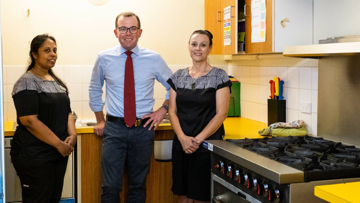 Preparing to serve up nutritious meals in the new Galloway Childrens Centre kitchen, Educator Ranee Dunbar, left, Northern Tablelands MP Adam Marshall and Educator Vanessa Cubunavanua.