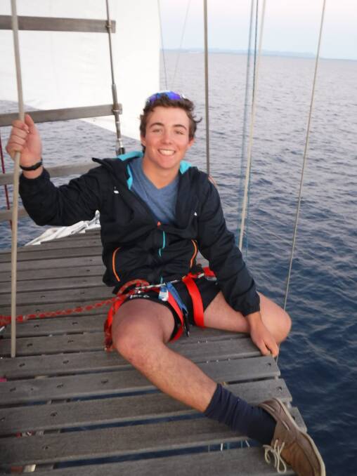 Will Swales part way up the mast of the Young Endeavour. 