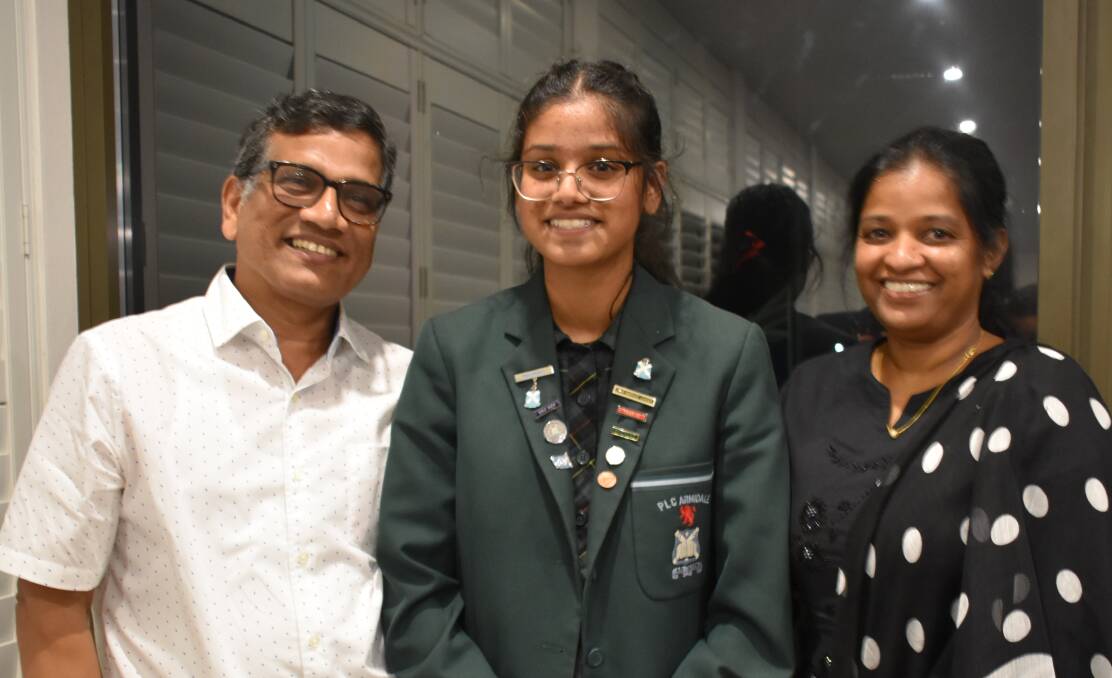 Lions Youth of the Year winner Thurkka Jeyakumar with her parents.