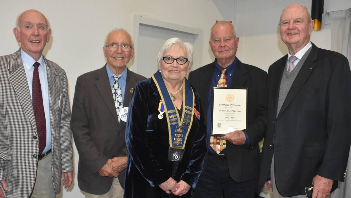 District Governor Lorraine Coffey with members of the Glen Innes Rotary Club, which has rejoined the district (from left) Bob Blair, Desmond Fitzgerald, Richard Rowe and Don Hall.