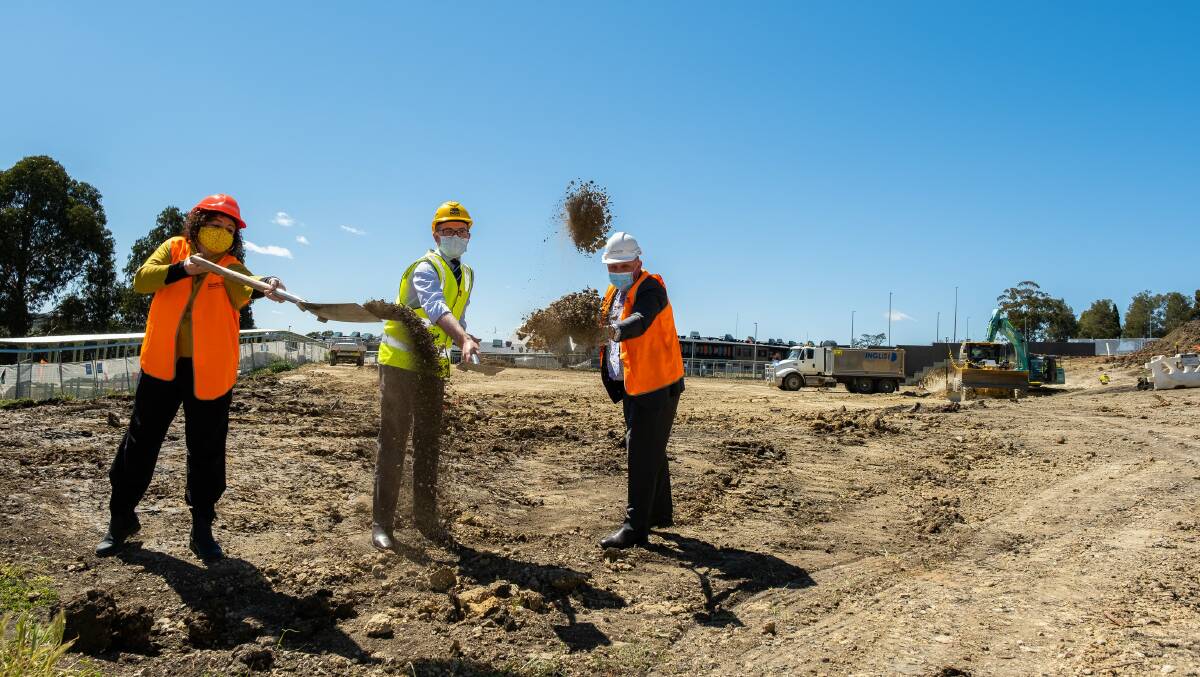 Turning the first ceremonial sod of soil to commence construction on the new $10.4 million Armidale Secondary College multi-purpose hall, Acting Principal Bree Harvey-Brice, left, Northern Tablelands MP Adam Marshall and NSW Department of Education Director Educational Leadership Matt Hobbs.