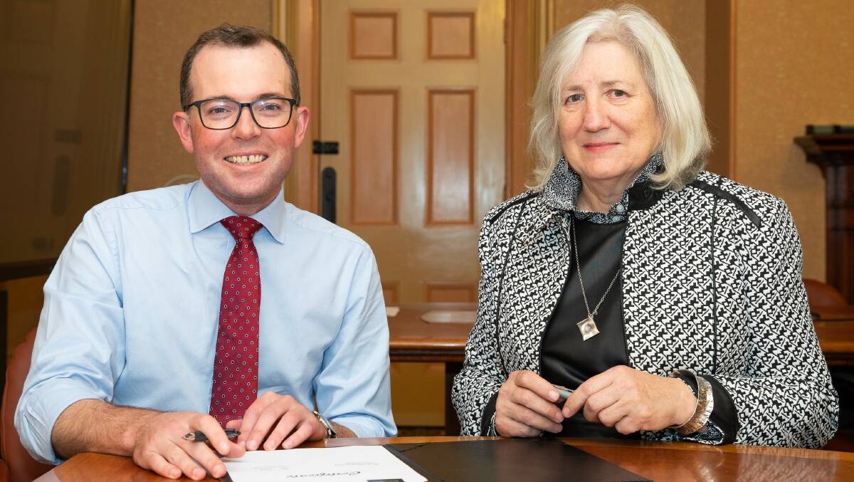 Northern Tablelands MP Adam Marshall with UNE vice chancellor Brigid Heywood who he believes should stand aside while facing an assault charge. Picture: Supplied