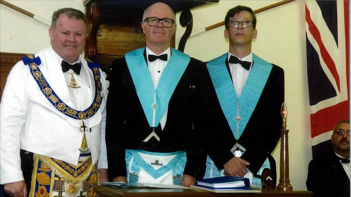 Grand Master of the United Grand Lodge of NSW & ACT James Melville with the Armidale Lodge's new master Adam Edwards and immediate past master Brendon Funnell.