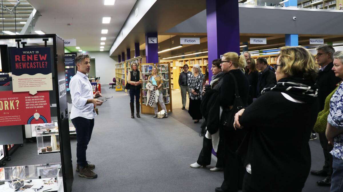 Renew Newcastle General Manager Christopher Saunders addresses the Renew in a Box display launch at Armidale War Memorial Library.