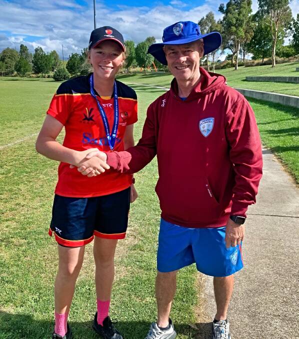 Central North captain Sophie Parsons and Greater Illawarra coach Steve Davies catch up after the sides clashed at the under-16 female Country Championships at Queanbeyan last week. Picture supplied