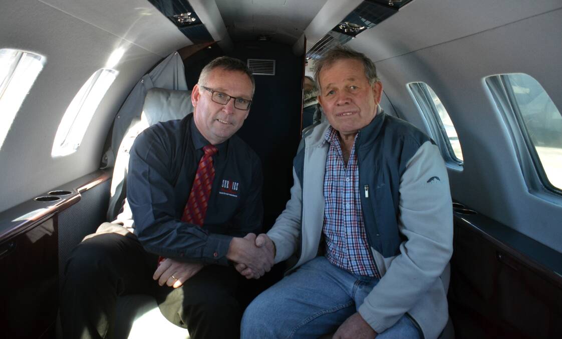SPECIAL VOYAGE: Armidale Services Club CEO Scott Sullivan with Hannah's grandfather, Adrian Whitton in the charter plane. Photo: Rachel Baxter.