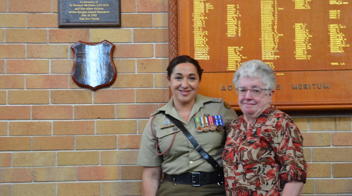 REMEMBER: Major Erica Van Ash and Mary Talty unveil a plaque to honour a late war nurse who was killed in the Bangka Island Massacre in 1942.