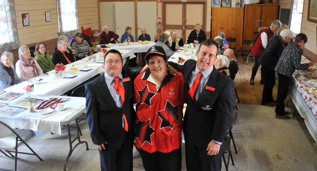 Sport stars: Special Olympics members Gregory Blanch, Sarah Williams and William Brunston at the Country Women's Association morning tea in Guyra on Friday.