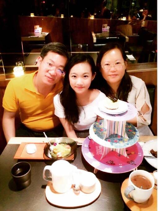 Exciting journey: Yuan Hsu from Taiwan with her parents. She dreams of making a difference in nursing.