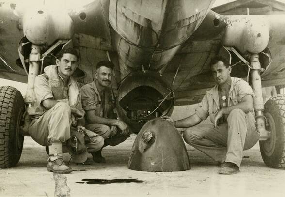 No. 78 Squadron members: Squadron Leader "Curley" Brydon, Jack Gibbons, probably Corporal Alfred John Gibbons, and Arthur Jones. Photo: Australian War Memorial.