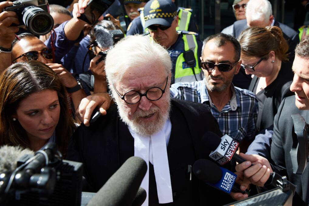 Centre of attention: Cardinal George Pell's lawyer Robert Richter QC leaves the County Court in Melbourne after the guilty verdict.