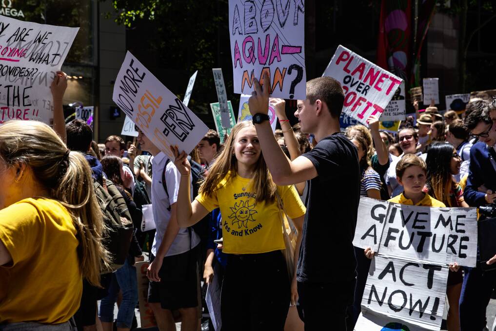 Taking action: School students gather in Sydney last year to strike and protest for climate change action. Photo: Louie Douvis.