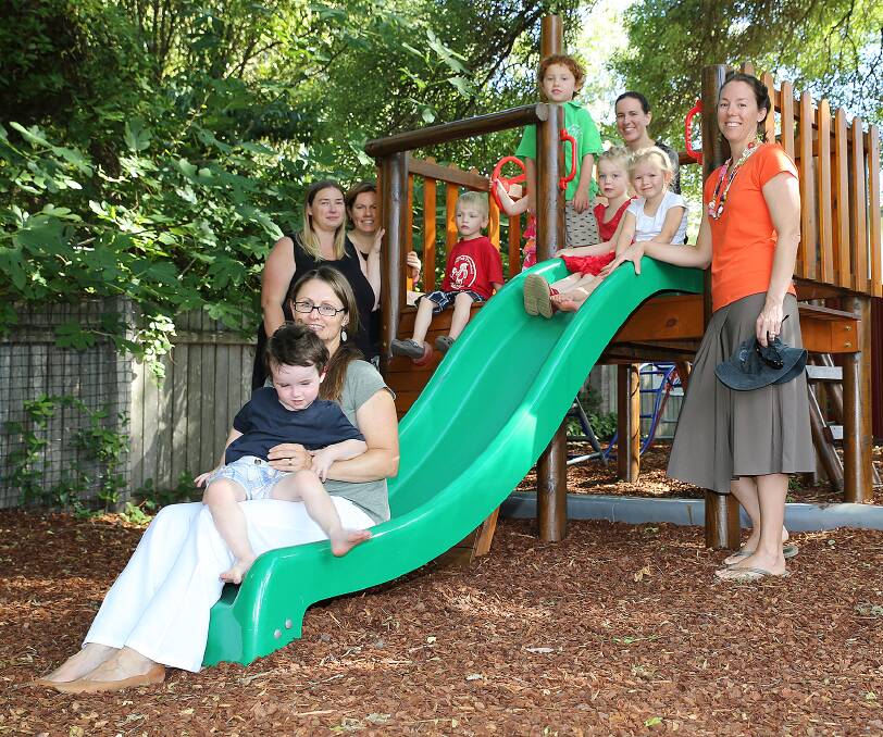 LEADING THE WAY: Members of the Drummond Park Preschool Management Committee and preschool students will all reap the benefits of the new system.