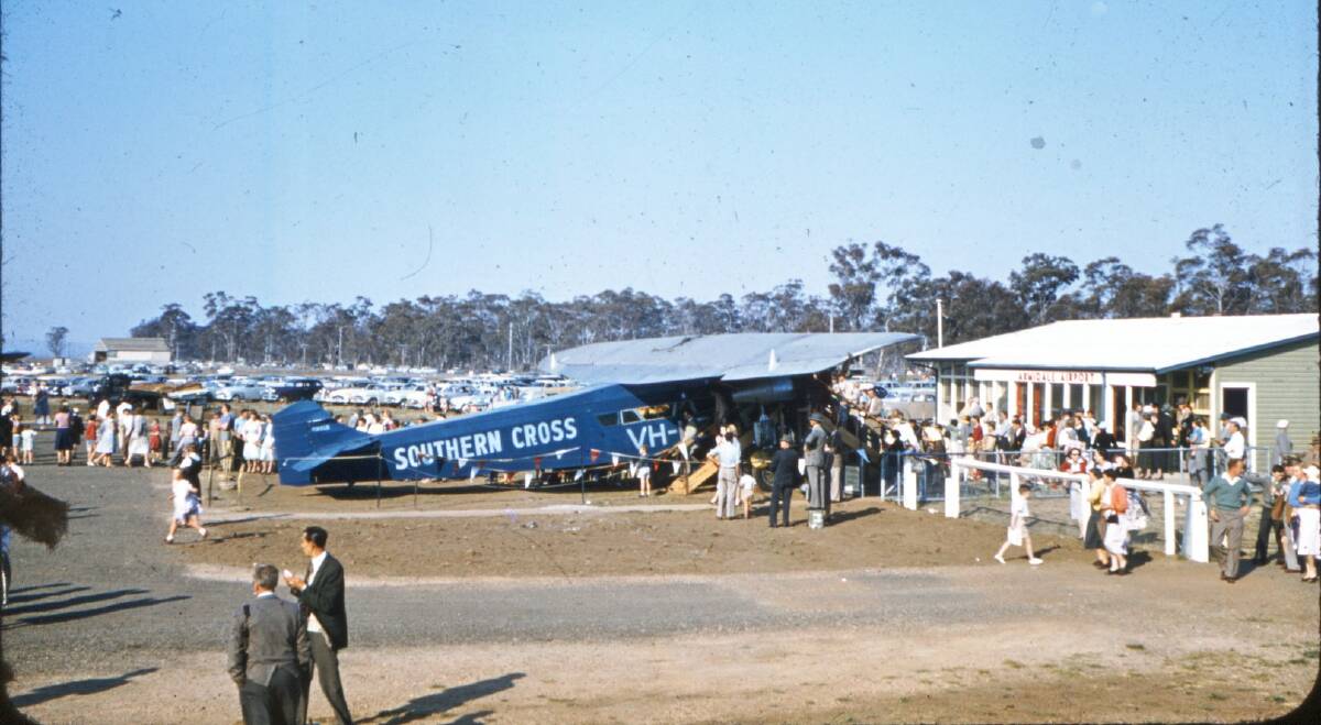 LOOKING BACK: In 1957, the original Southern Cross aircraft, flown by Sir Charles Kingsford Smith, attracted residents from across the New England on a visit Armidale during a tour of the Australian coast.