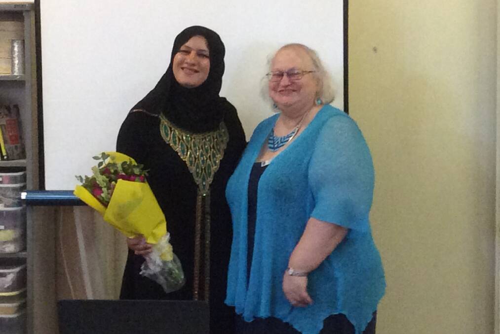 TOGETHER: Dunya Alruhalmi with CWA member Ann Golding.