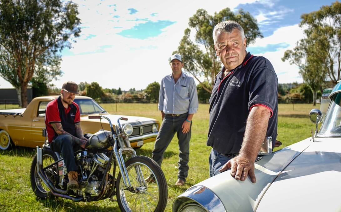New England Rods and Customs member Greg Love with son Ben Love on his custom bike and Michael Clarke (centre). The club is hosting their 12th annual hot rod run this weekend at the Armidale Tourist Park.
