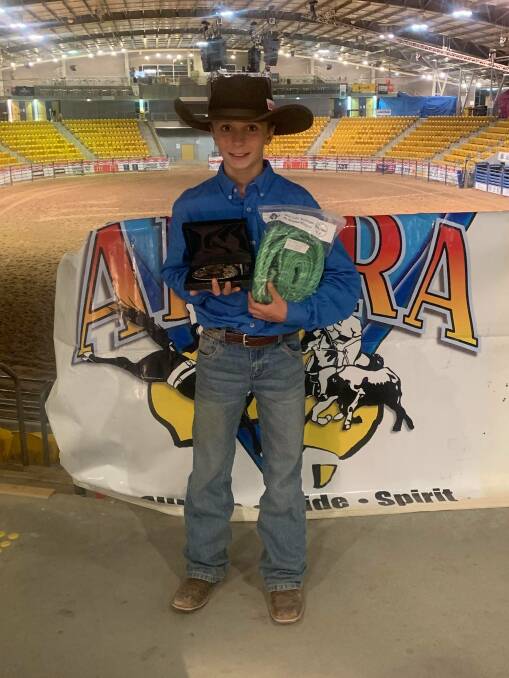 Brodie Meredith with his prizes from winning at the National Junior Rodeo Finals. 