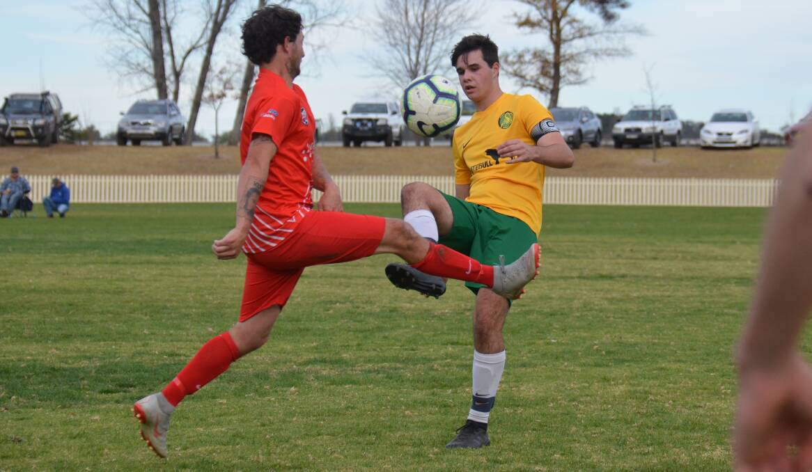 CLOSE FINISH: The Redmen fended off a fast-finishing South Armidale team on Saturday. 