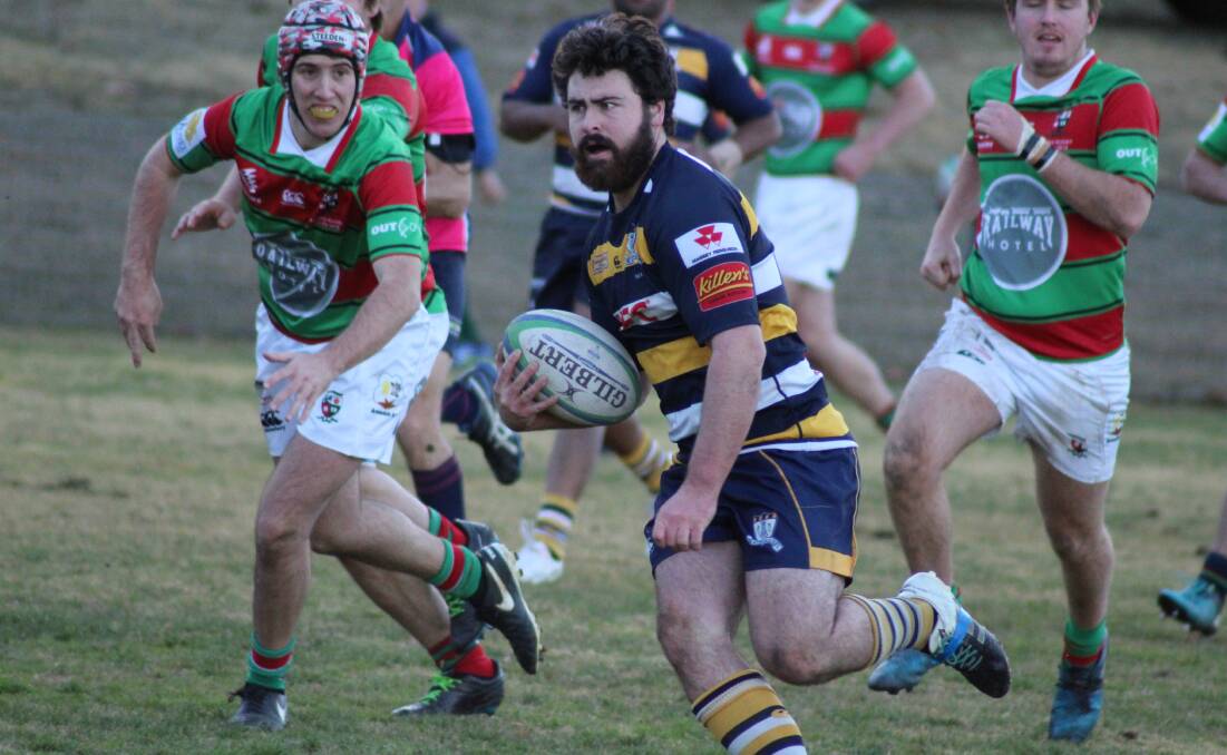 TRY TIME: Armidale Blues' Brendan Czinner races away for a five-pointer in Saturday's demolition of St Albert's College. Photo: Catherine Stephen. 