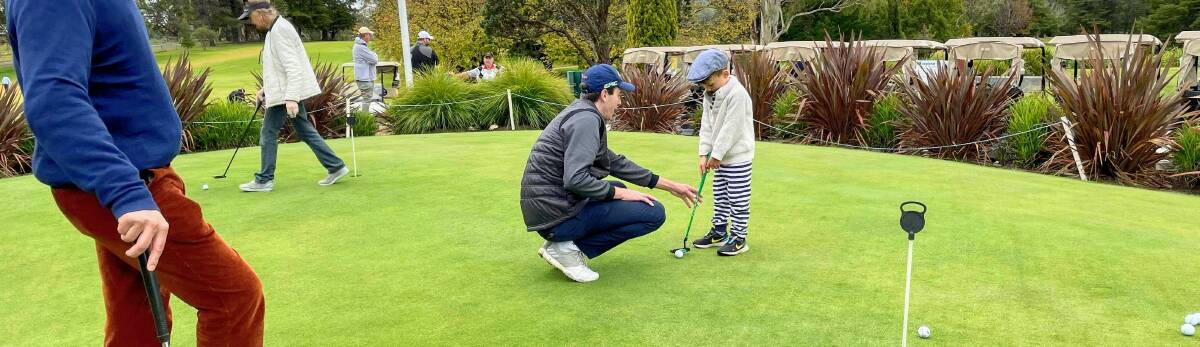 FOCUSED: Golfers young and old turned out to learn from the professionals. 