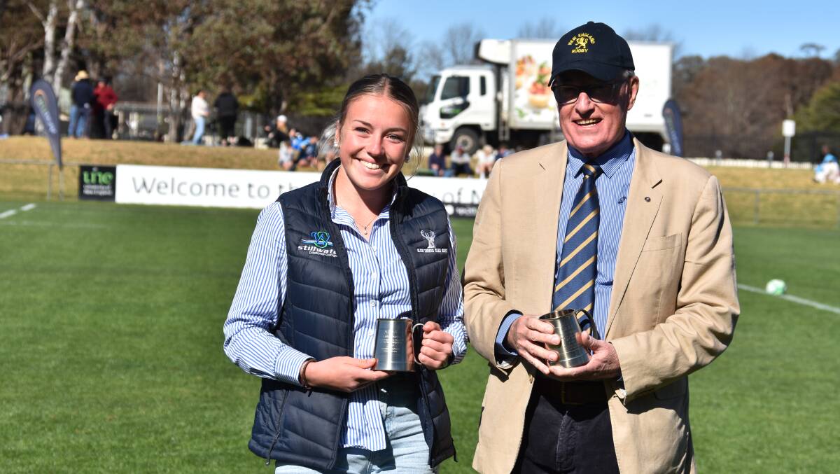 Brooke Klingner, pictured with NERU president David Clifton, was joint winner of the Alana Thomas Player of Most Promise award.