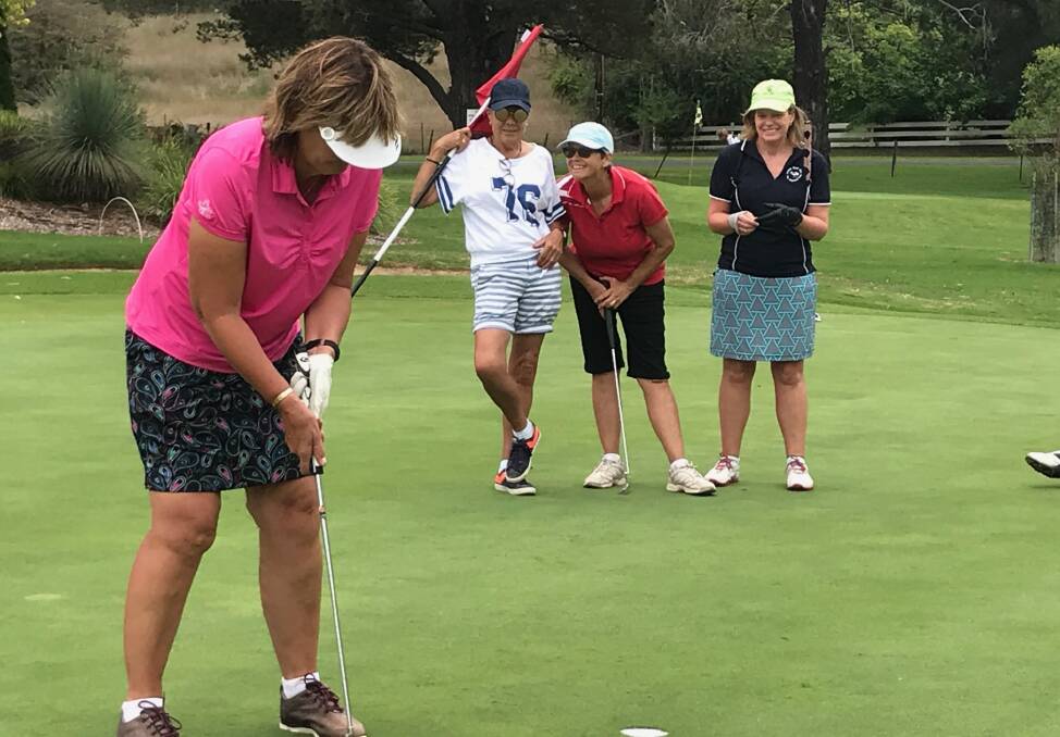 NAILED IT: Amanda Carr putts in on the 18th hole to win the Armidale Regional Bank Australia Ladies Div 1 Championship. 