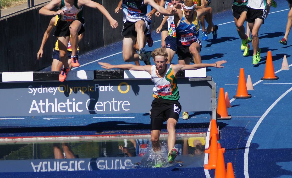 FIRING: Henry Sindel finished with gold in the 2000 metre steeplechase at the NSW Junior Athletics Championships. Photo: Contributed. 