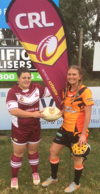 MAKING INROADS: South West Robin's Jodie Howarth and Uralla Tigers' Ella Elks at the first round of Group 4's nines. Photo: Country Rugby League. 