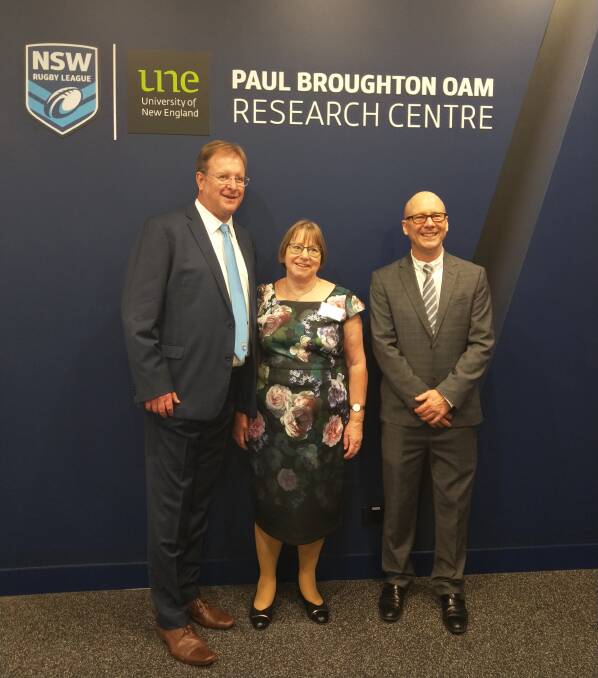 NSWRL chief executive David Trodden, UNE Vice-Chancellor Professor Annabelle Duncan and Director of UNE Sydney, Robert Field, in front of the Centre of Excellence. 