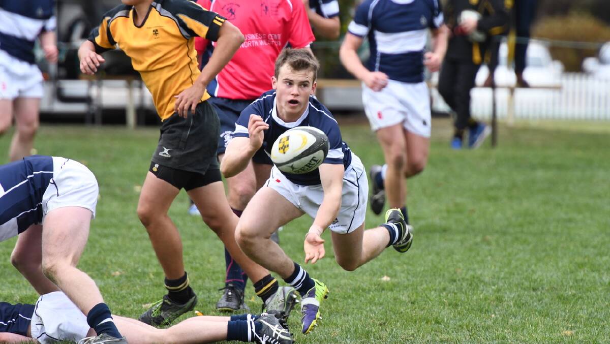 Halfback Tully Muller gets the ball away for TAS in their 24-6 win over Sydney Grammar.  Photo: John Hamparsum.