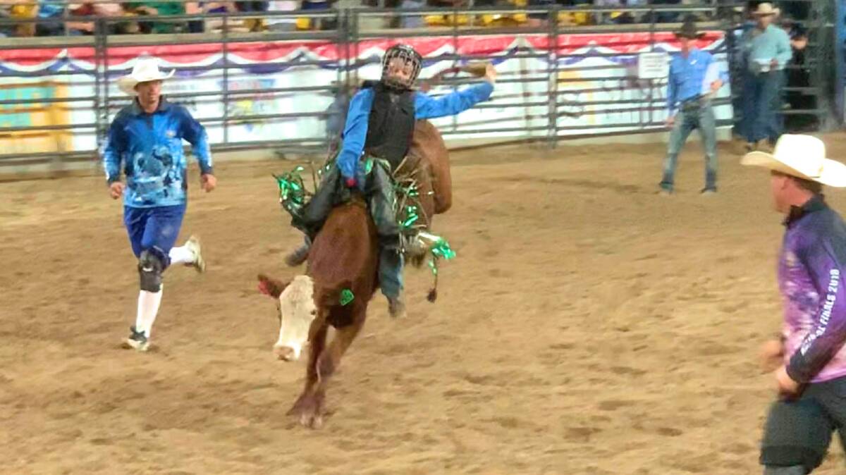 No bull: Brodie Meredith steers his way to a buckle win