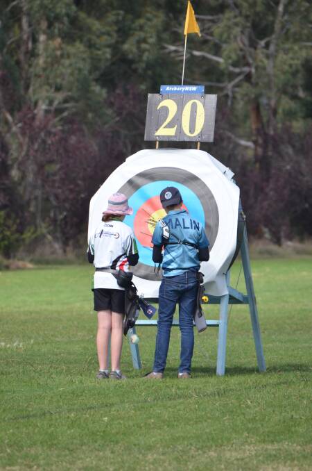 Mackenzie Harper inspects her target at Monday's event. 