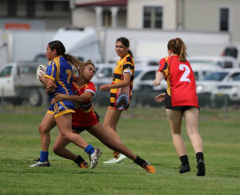 TOUGH: Captain of the Narwan under 17 side Kayla Kim played in the halves in the nines competition. Photo: Lynverell Photography. 