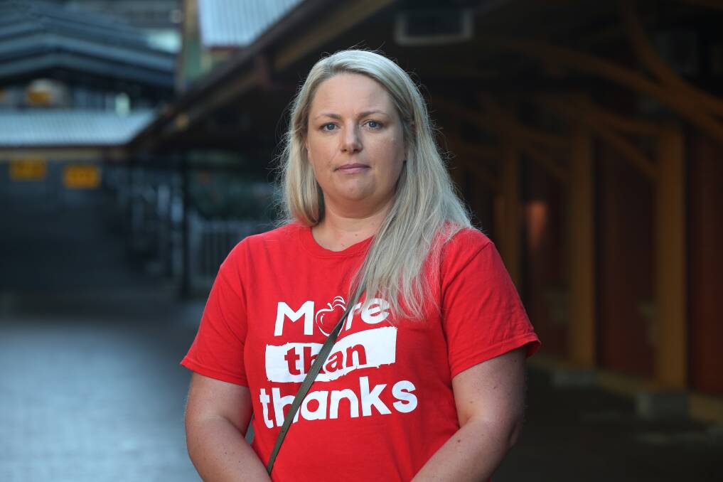 Amber Chapman at Wollongong Train Station before departing for Sydney to join the strike action protest. Picture: Robert Peet