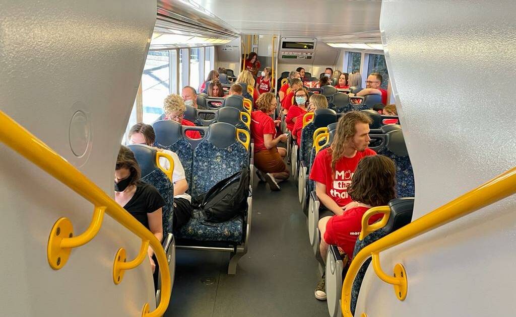 South Coast Line carriages were filled with teachers on the way to strike in Sydney. Of the public sector teachers not on the train, they were using the unpaid day to catchup on mounting work. Picture: Desiree Savage