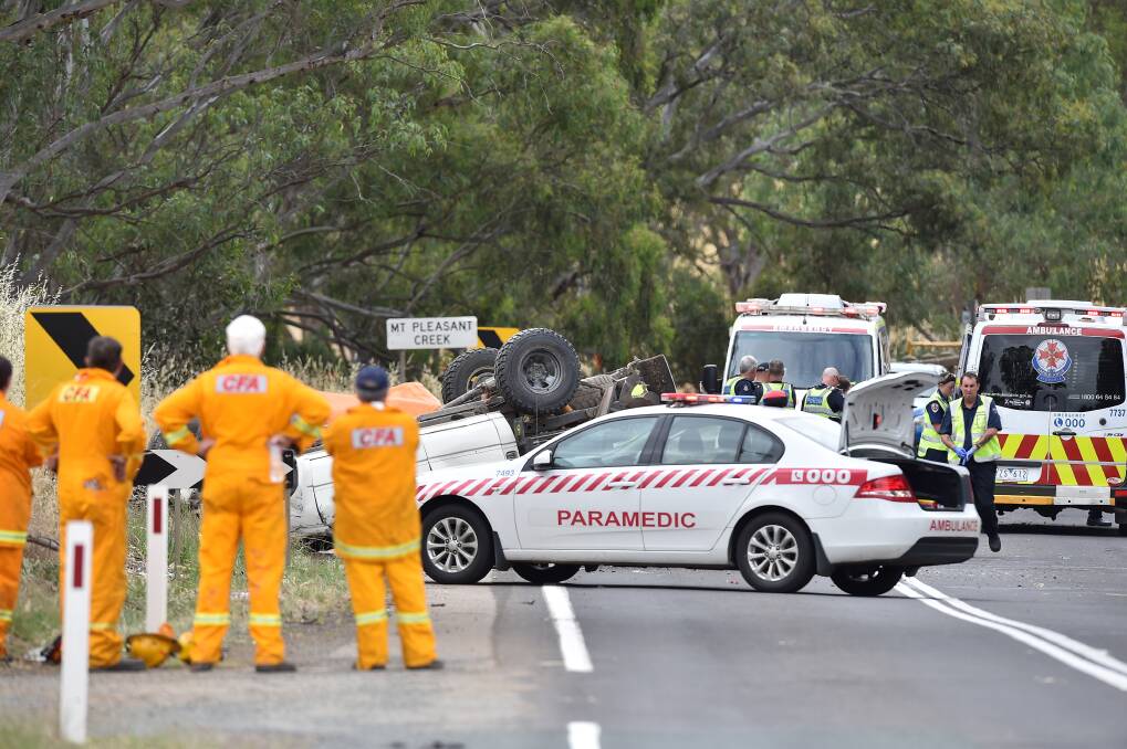 A woman was killed when the sedan in which she was travelling collided with a 4WD. Eight others were injured in the incident. Picture: GLENN DANIELS