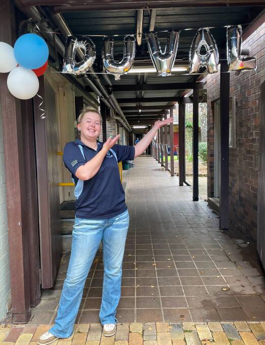 Residential leader Jess MacMillan ready to welcome incoming students to the Duval campus. 