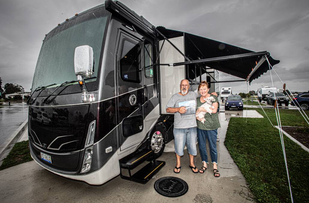 Christopher and Mari Annett and dog Punky Brewster with their Tiffin motorhome, which has self-levelling airbag suspension and sets up in about 15 minutes. Picture: Karleen Minney 