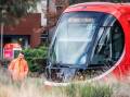 It might be big and red, but someone failed to see the Canberra tram coming. The collision with a pedestrian was so forceful that it cracked the laminated windscreen. Picture: Karleen Minney 