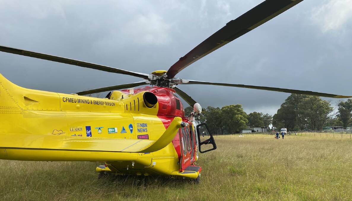 EMERGENCY: The Westpac rescue helicopter was called to airlift a woman to Tamworth hospital after a farm accident. Photo: WRHS